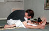 yoga.com pose variante de ardha paschimottana asana